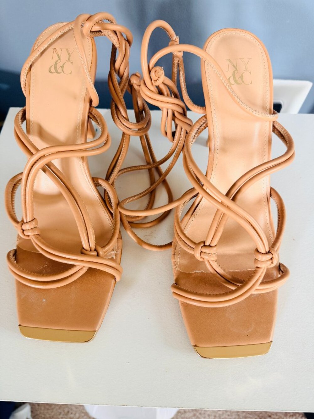 Beige leather heels from New York & Company for women, size 11 US.